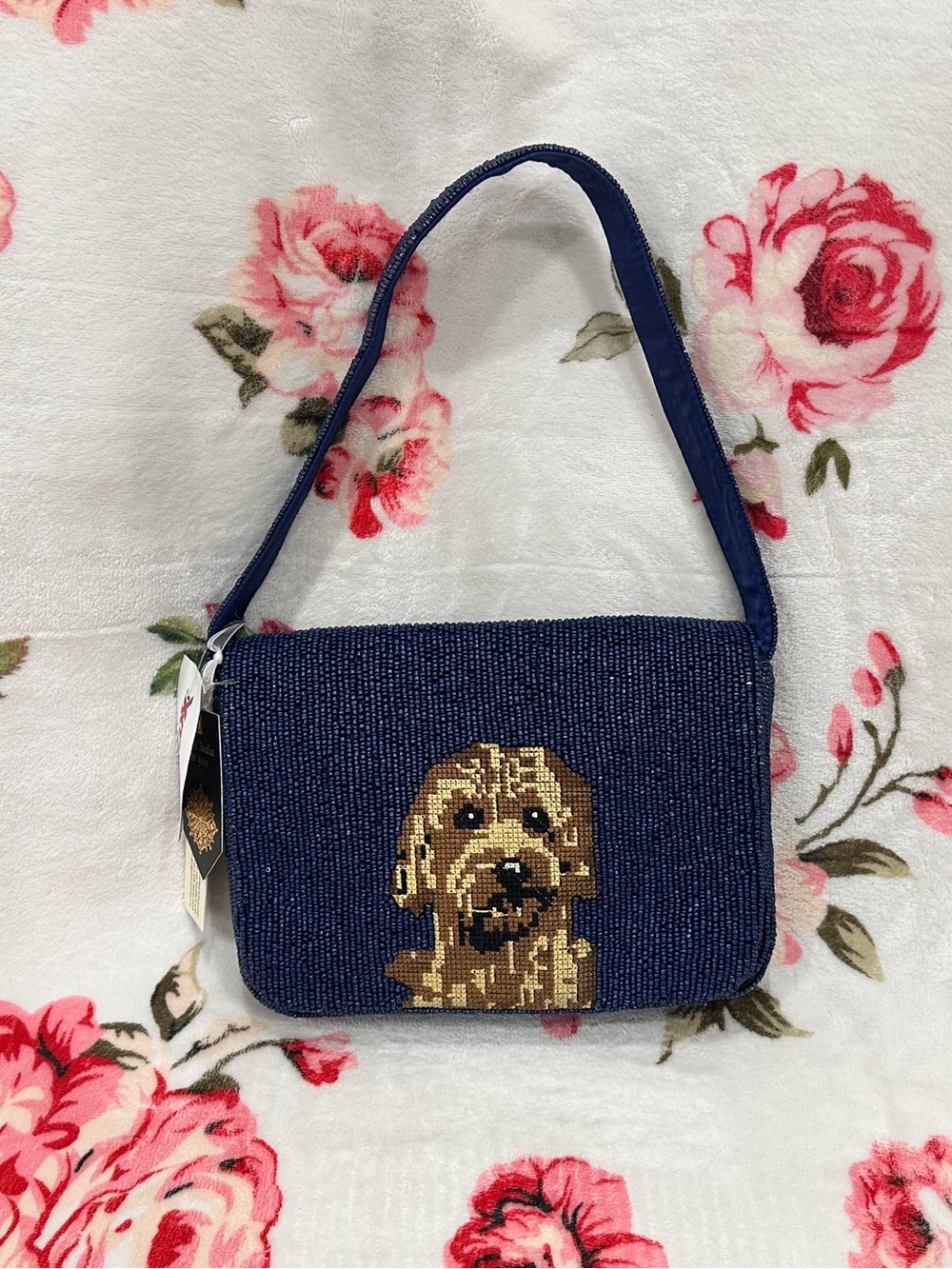 Navy blue beaded shoulder bag featuring a cute goldendoodle
